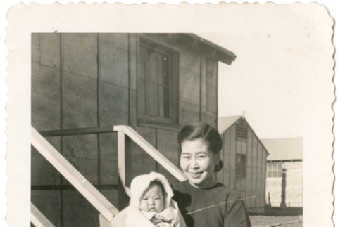 Nobu Arai holding Joanne Masaye Arai (ddr-densho-430-180)