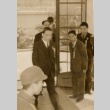 Wang Jingmei entering a building (ddr-njpa-1-1032)