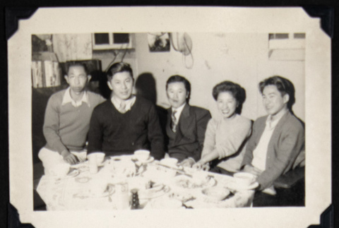 Group at a dining table (ddr-densho-542-644)