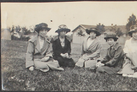 Five women seated outside (ddr-densho-278-109)