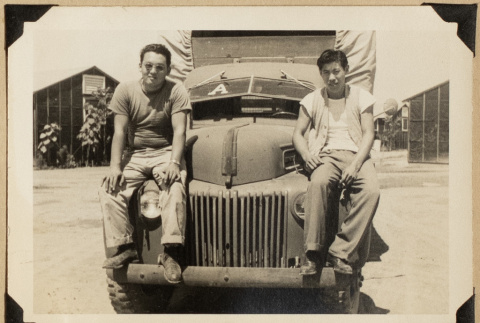 Roy and George on a truck (ddr-densho-542-553)