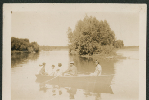 family in a row boat (ddr-densho-378-658)