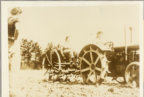 Women driving a tractor (ddr-njpa-13-224)