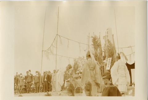 Buddhist [?] ceremony and patients [?] standing at river's edge (ddr-njpa-6-114)