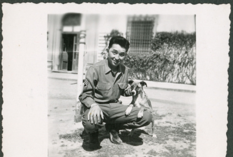 Taro Katayama with dog (ddr-densho-368-482)