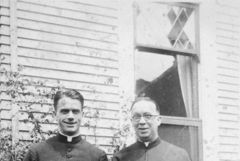 (Photograph) - Image of two priests in front of building (ddr-densho-330-258-master-1bbd9ecaff)