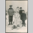 Three boys by snowman (ddr-densho-523-232)