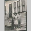 Couple outside house (ddr-densho-523-187)