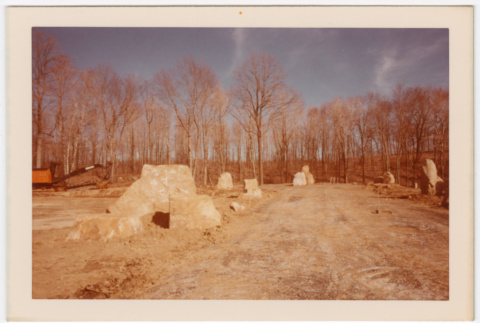 Rock pilars lining dirt road (ddr-densho-377-2175)