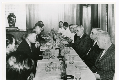 Former crew members of PT 109 at lunch with former crew members of the Japanese destroyer Amagiri (ddr-densho-1007-127)