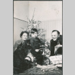 Agnes, Chester and Jon David Sakura on Christmas morning. (ddr-densho-523-76)