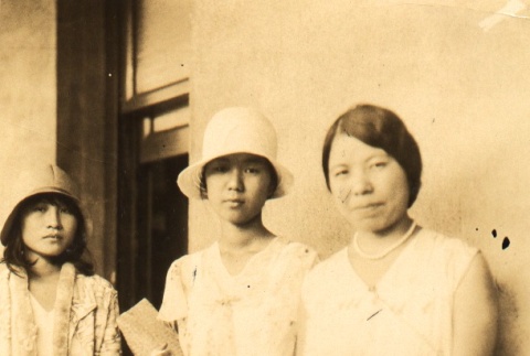 Musashino Women's University professor, Shizuko Kawasaki, posing with two young women (ddr-njpa-4-565)