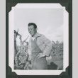 Man standing in a field (ddr-densho-471-183)