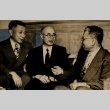 A Buddhist bishop talking with two men (ddr-njpa-4-1709)