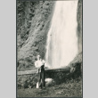 Man and baby in front of Multnomah Falls (ddr-densho-523-129)