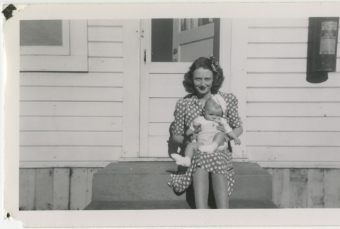 Woman holding a baby (ddr-manz-7-102)