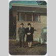 Man and woman standing in front of building (ddr-densho-332-4)