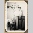 Gary Kikawa in a bedroom (ddr-densho-542-507)