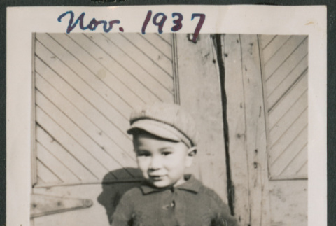 Photo of a toddler in a jacket and hat (ddr-densho-483-703)