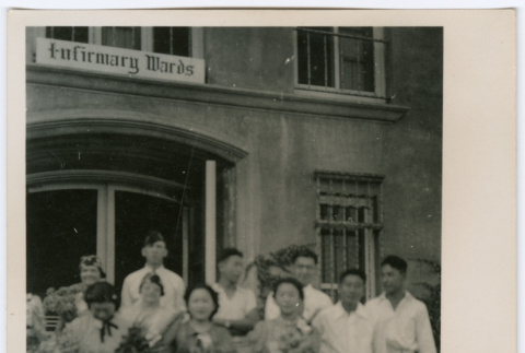 Group of ten outside infirmary wards (ddr-densho-329-833)