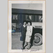 Two women in front of a truck (ddr-manz-10-44)