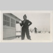 Woman holding a snowball (ddr-manz-7-78)