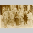 Chiang Kai-shek and others standing on the front steps of a building (ddr-njpa-1-1760)