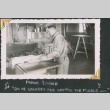 Man using table saw in shop (ddr-densho-434-334)