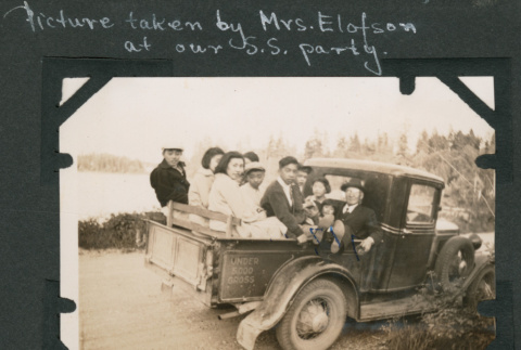 Photo of a Sunday school class in the back of a pickup truck (ddr-densho-483-232)