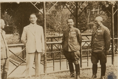Wang Jingwei standing with two military leaders (ddr-njpa-1-1050)