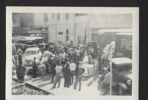 Photograph of men moving (ddr-csujad-55-2626)