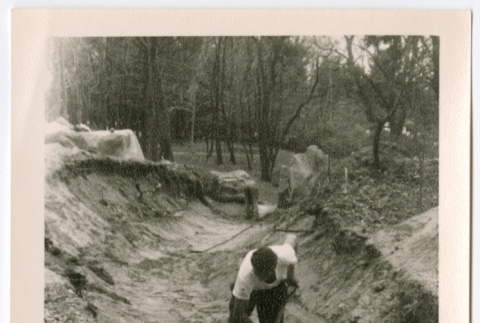 Man digging (ddr-densho-377-2018)