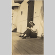 Woman sitting on deck of ship (ddr-densho-426-1798)