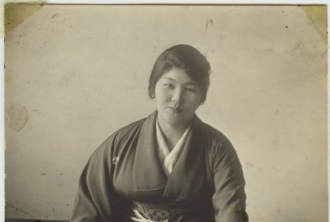 Japanese American woman with koto (ddr-densho-242-30)