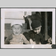 Two boy sitting on stoop, one crying (ddr-densho-483-539)
