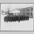 Men standing in formation in snow (ddr-densho-434-479)