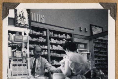 Shopping at The Owl Drug Co. (ddr-densho-542-112)