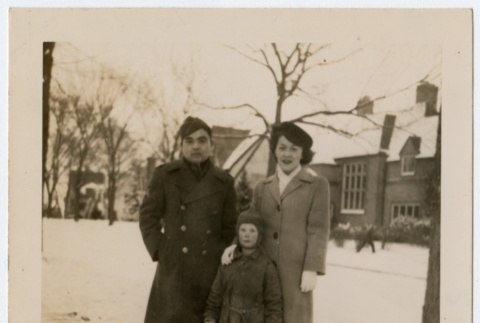 Nisei soldier with Nisei woman and child (ddr-densho-325-100)