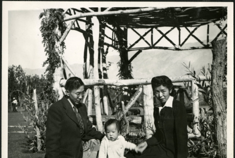 Manzanar, orphanage, garden, couple and child (ddr-densho-343-39)