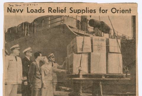 Seattle Times: Navy Loading Relief Supplies to Orient (ddr-densho-446-439)