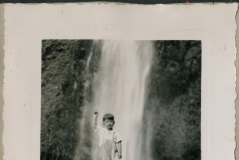 Boy standing in front of Multnomah Falls (ddr-densho-523-123)
