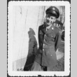 Man standing by wall (ddr-densho-434-451)