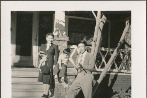 A family standing in front of their house (ddr-densho-298-296)