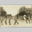 Soldiers carrying wooden stakes and tools (ddr-njpa-13-1437)
