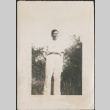 Man with hands in pockets (ddr-densho-523-9)