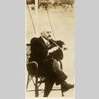 A man seated outside (ddr-njpa-1-2240)