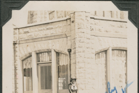Woman on steps of stone building (ddr-densho-316-95)