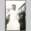 Photograph of Peter Hondo in a wheelchair at Manzanar (ddr-csujad-47-248)