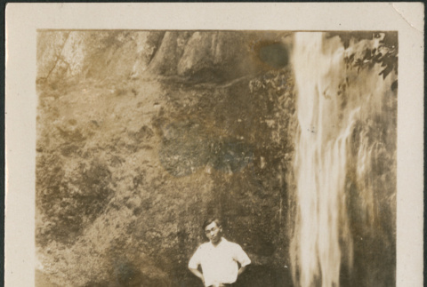 Man by waterfall (ddr-densho-316-254)