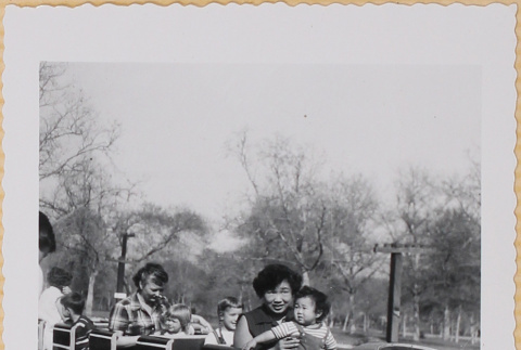 Yoshiko and Susan Shiomi on play train (ddr-densho-522-232)